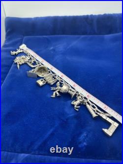 Vintage German 835 Sterling Silver Charm Bracelet 12 Charms 7 3/8 in Length Vintage German 835 Sterling Silver Charm Bracelet 12 Charms 7 3/8 in Length