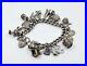 Vintage-Hallmarked-Sterling-Silver-Charm-Bracelet-with-White-Metal-Charms-01-vg