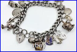 Vintage Hallmarked Sterling Silver Charm Bracelet with White Metal Charms