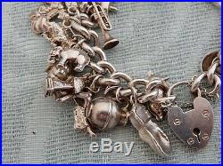 Vintage Ladies 100g Sterling Silver Charm bracelet with 34 original charms