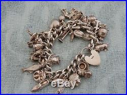 Vintage Ladies 100g Sterling Silver Charm bracelet with 34 original charms