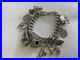 Vintage-Loaded-Solid-Sterling-Silver-Curb-Link-Charm-Bracelet-withCharms-81-Grams-01-qf