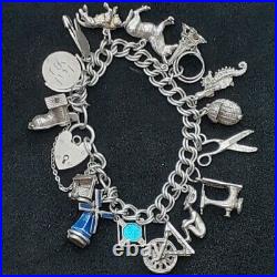 Vintage SILVER CHARM BRACELET with 16 Silver Charms 55g HM 1965