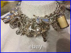 Vintage Silver Charm Bracelet, C/w 27 Charms. Total Weight 129g