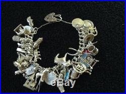 Vintage Silver Charm Bracelet- Mid To Late 1960s. 38 Attached Charms