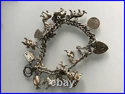 Vintage Silver Charm Bracelet With 12 Charms & 2 Place Shields