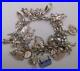 Vintage-Silver-Charm-Bracelet-With-32-Charms-83g-18cm-01-val