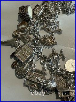 Vintage Silver Charm Bracelet With Many Unusual Charms 66g Weight Not Scrap Vintage Silver Charm Bracelet With Many Unusual Charms 66g Weight Not Scrap