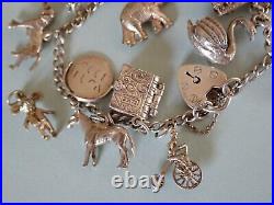 Vintage Silver Charm Bracelet with 15 charms bible swan pixie piano horse dog