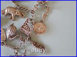 Vintage Silver Charm Bracelet with 15 charms bible swan pixie piano horse dog