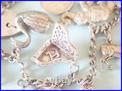 Vintage Silver Charm Bracelet with 15 charms bible swan pixie piano horse dog