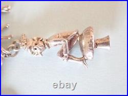 Vintage Silver Charm Bracelet with 15 charms bible swan pixie piano horse dog