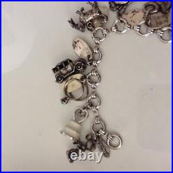 Vintage Silver Charm Bracelet with 17 Charms plus tags, 14 Sterling, 1 Stanhope