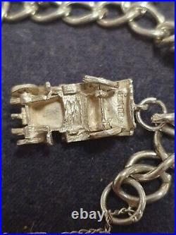 Vintage Silver bracelet with charms interestin Atic find
