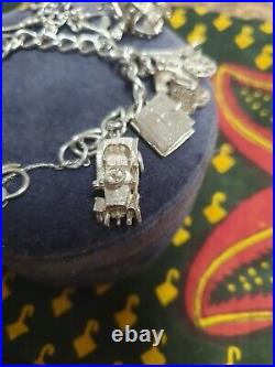 Vintage Silver bracelet with charms interestin Atic find
