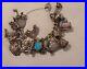 Vintage-Silver-charm-bracelet-with-30-charms-and-safety-chain-01-mwo