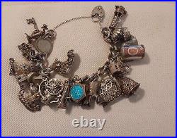 Vintage Silver charm bracelet with 30 charms and safety chain