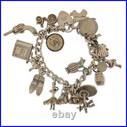 Vintage Silver charm bracelet with silver charms Dated 1976 C, 75.0g