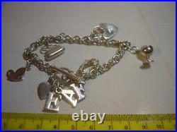 Vintage Solid Silver 9 Charm Bracelet with T-Bar Lock-Very Heavy, 7.5, Designer