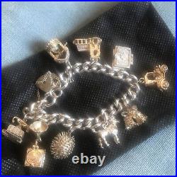 Vintage Solid Silver Charm Bracelet & 10 Different Charms Vgc