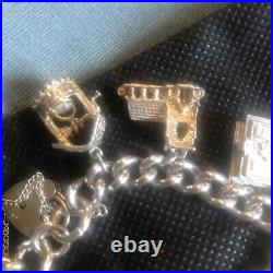 Vintage Solid Silver Charm Bracelet & 10 Different Charms Vgc