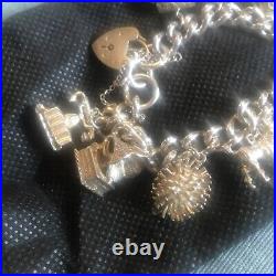 Vintage Solid Silver Charm Bracelet & 10 Different Charms Vgc