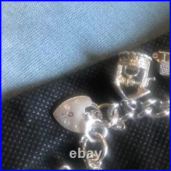 Vintage Solid Silver Charm Bracelet & 10 Different Charms Vgc