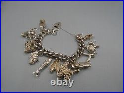 Vintage Solid Silver Charm Bracelet 114 Grams 11 Charms Some Rare