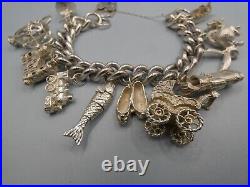 Vintage Solid Silver Charm Bracelet 114 Grams 11 Charms Some Rare