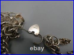 Vintage Solid Silver Charm Bracelet 114 Grams 11 Charms Some Rare