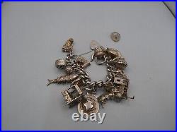 Vintage Solid Silver Charm Bracelet 154 Grams 15 Charms Some Rare