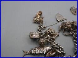 Vintage Solid Silver Charm Bracelet 154 Grams 15 Charms Some Rare