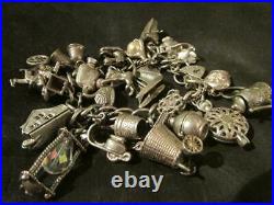 Vintage Solid Silver Charm Bracelet & 23 Rare Silver Charms, Openers, Chim, Nuvo87g