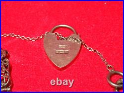 Vintage Solid Silver Charm Bracelet 57 Grams 8 Charms Some Rare Birm 1970