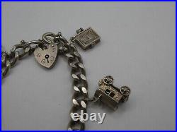 Vintage Solid Silver Charm Bracelet 58 Grams 7 Charms Some Rare