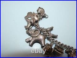 Vintage Solid Silver Charm Bracelet 67 Grams 16 Charms Some Rare