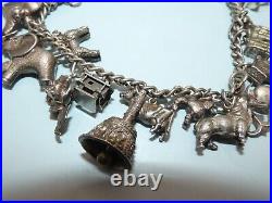 Vintage Solid Silver Charm Bracelet 67 Grams 16 Charms Some Rare