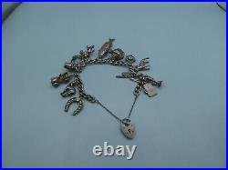 Vintage Solid Silver Charm Bracelet 69 Grams 13 Charms Some Rare