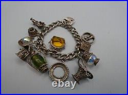 Vintage Solid Silver Charm Bracelet 78 Grams 11 Charms Some Rare 1970