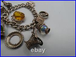 Vintage Solid Silver Charm Bracelet 78 Grams 11 Charms Some Rare 1970