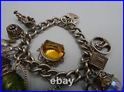 Vintage Solid Silver Charm Bracelet 78 Grams 11 Charms Some Rare 1970