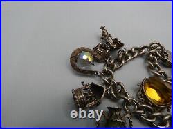 Vintage Solid Silver Charm Bracelet 78 Grams 11 Charms Some Rare 1970