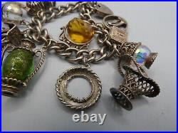 Vintage Solid Silver Charm Bracelet 78 Grams 11 Charms Some Rare 1970