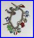 Vintage-Solid-Silver-Charm-Bracelet-Mostly-Enamel-Country-Charms-Etc-16cm-Long-01-hr