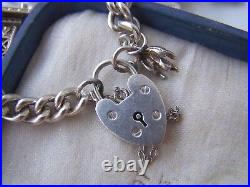 Vintage Solid Sterling Silver Charm Bracelet 11 Rare Charms Paddlock Heavy 48.2