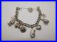 Vintage-Solid-Sterling-Silver-Charm-Bracelet-54-Grams-8-Charms-Some-Rare-01-ts