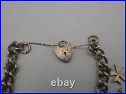 Vintage Solid Sterling Silver Charm Bracelet 54 Grams 8 Charms Some Rare