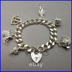 Vintage Solid Sterling Silver Charm Bracelet Hallmarked 1974 18cm (7) 75.3g