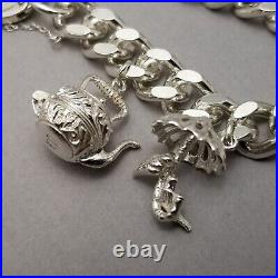 Vintage Solid Sterling Silver Charm Bracelet Hallmarked 1974 18cm (7) 75.3g