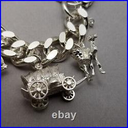 Vintage Solid Sterling Silver Charm Bracelet Hallmarked 1974 18cm (7) 75.3g